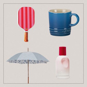 a blue cup and a red and white umbrella