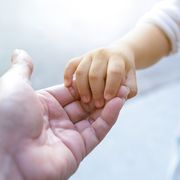 prayers for protection  child's hand holding adult's hand