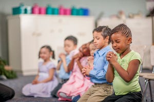 praying together in class