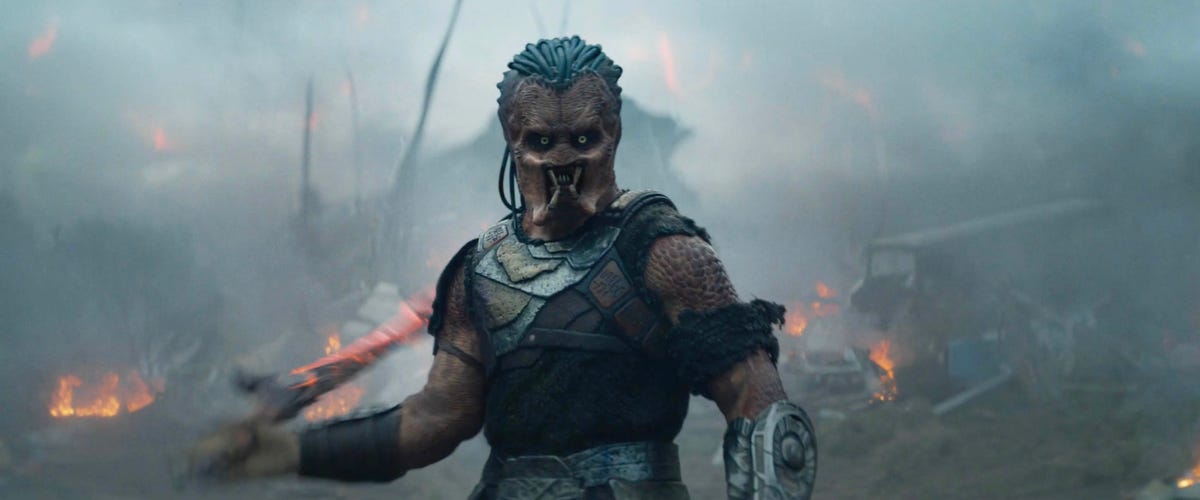 A modern and engaging visual representation of Predator: Badlands, featuring a futuristic landscape and elements from the Predator universe.