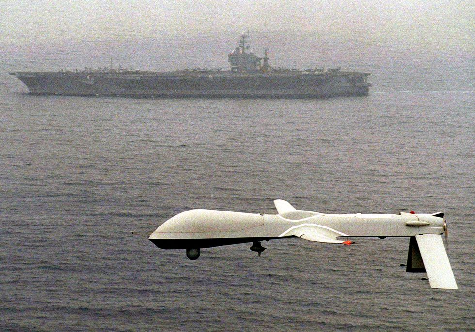 A Predator UAV (unmanned aerial vehicle) flies abo