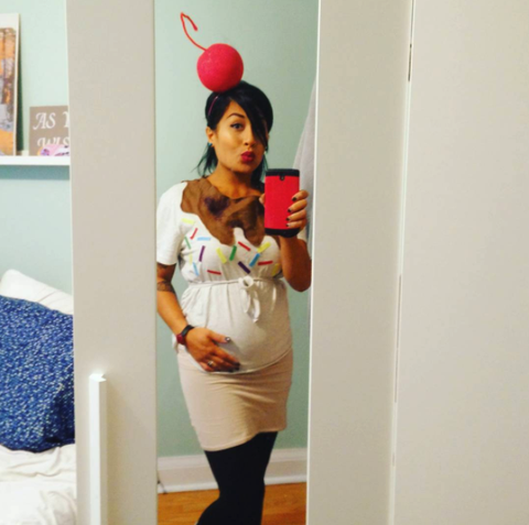 rachenne regozo dresses in an ice cream sundae pregnant halloween costume with a cherry hat