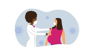 pregnant woman getting covid 19 vaccine shot