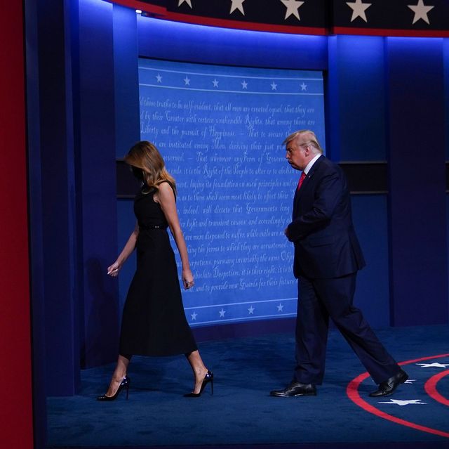 melania trump and donald trump exiting the stage separately