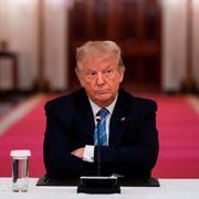 president-donald-trump-sits-with-his-arms-crossed-during-a-news-photo-1676577265.jpg?crop=0.668xw:1.00xh;0.159xw,0&resize=180:*