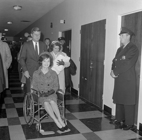 John F Kennedy Pushing Jackie in Wheelchair