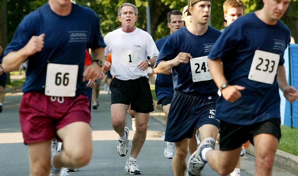us president george w. bush runs in a 3 mile race