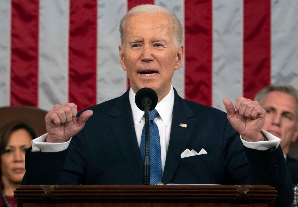 joe biden speaking at a podium in front of congress for state of the union