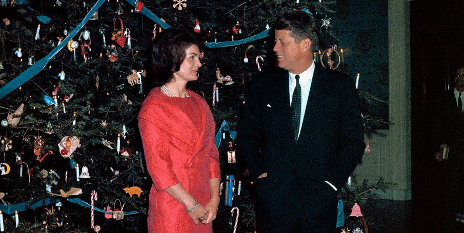 Jacqueline and John Fitzgerald Kennedy Posing with Their Christmas Tree