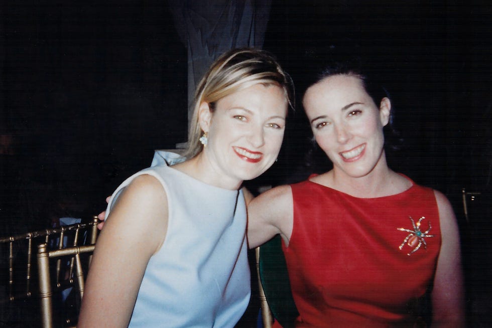 two women posing together at an event