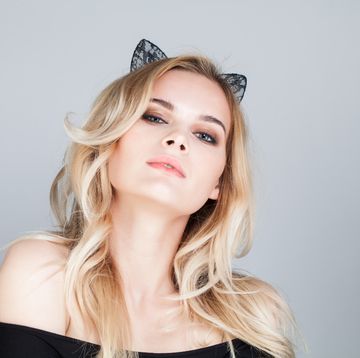 pretty alluring female model with black cat ears hairdeco