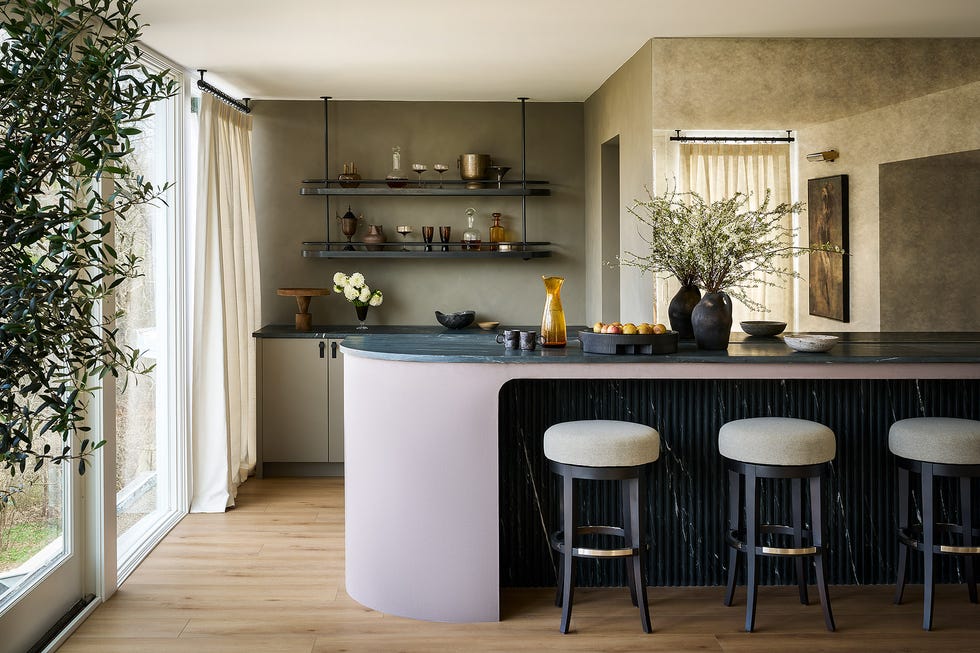 colorful sunroom bar with stools