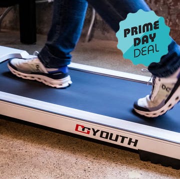 personal massage device and a person walking on a treadmill personal massage device and a person walking on a treadmill