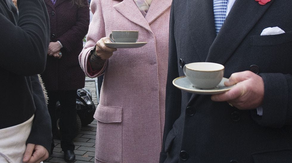 The Prince Of Wales And The Duchess Of Cornwall Visit Swiss Cottage Farmers' Market