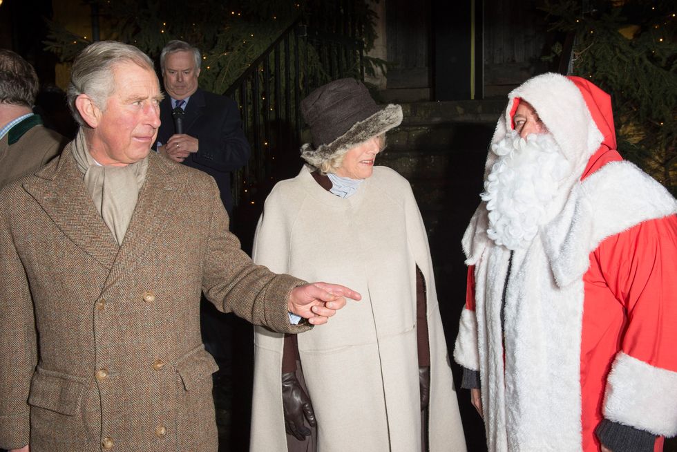 Prince Charles And The Duchess Of Cornwall Switch On The Christmas Lights In Tetbury