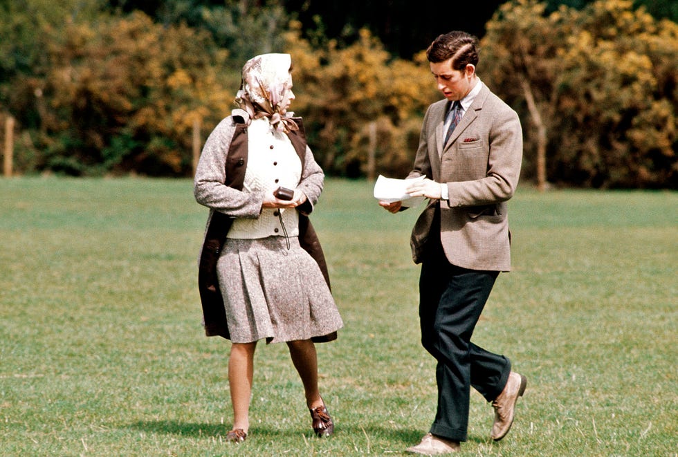 gbr prince charles, the prince of wales walks with queen elizabeth ll