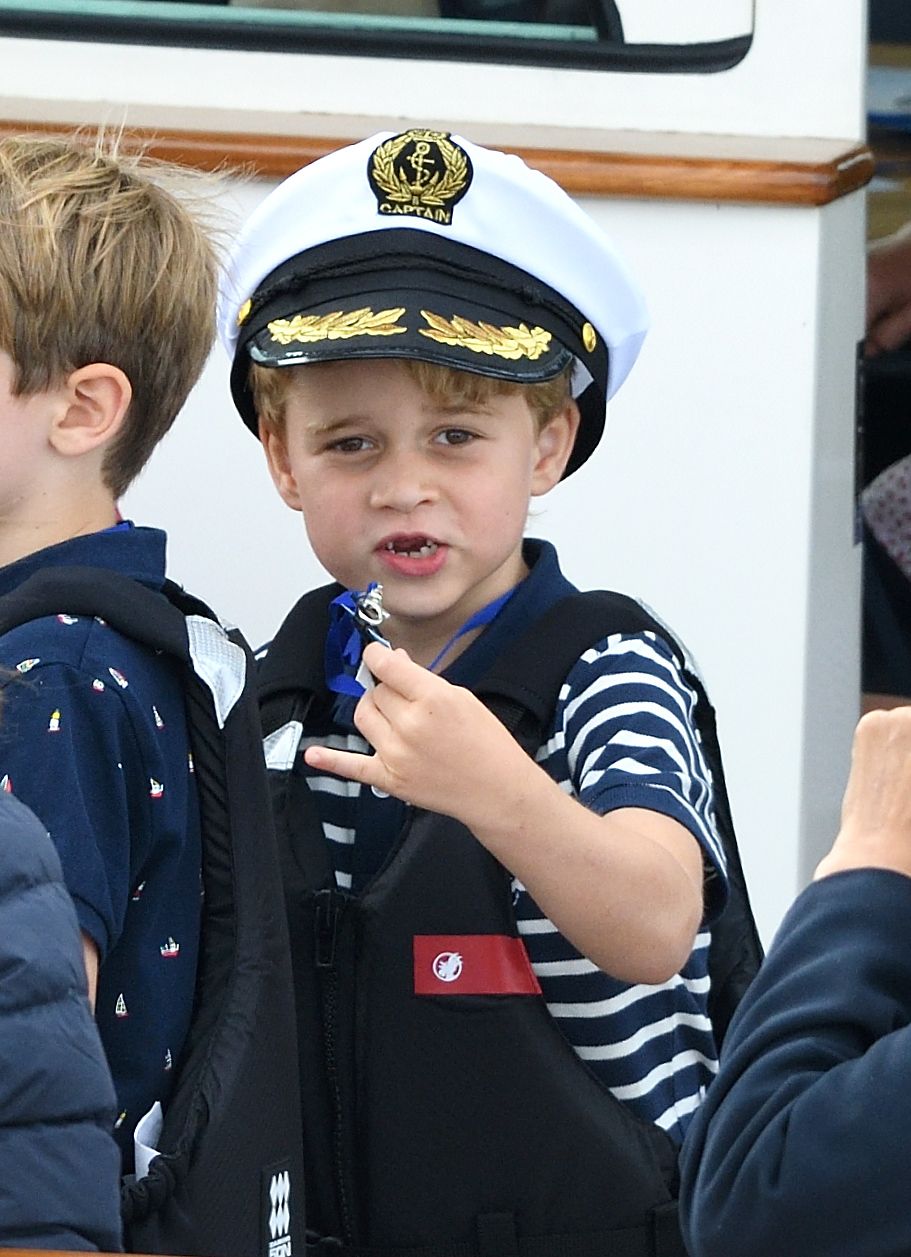The Duke And Duchess Of Cambridge Take Part In The King's Cup Regatta and prince george watches