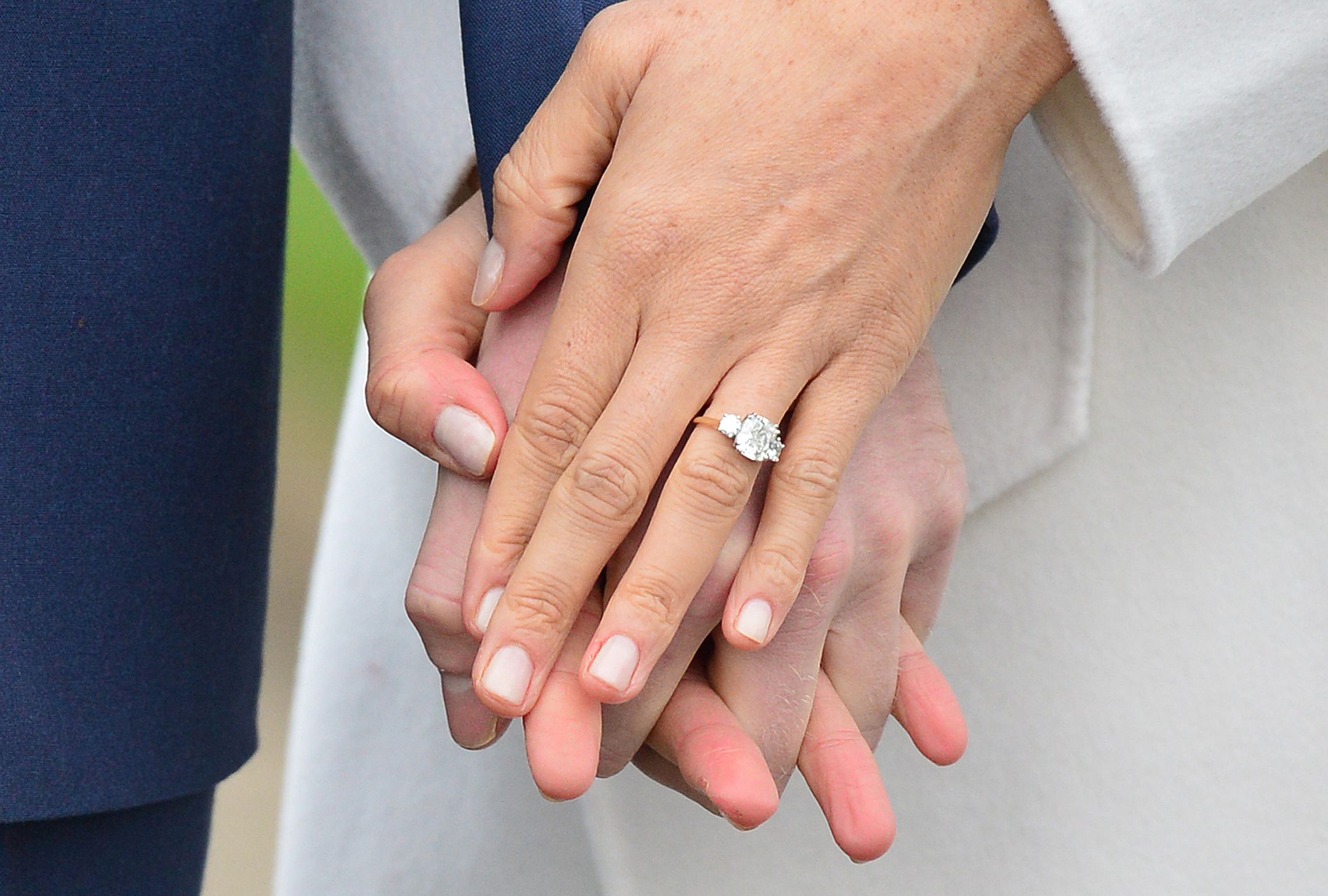 Meghan Markle SLAMMED for 'blinging up' engagement ring with even MORE  diamonds - Heart