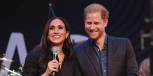 prince harry, duke of sussex and meghan, duchess of sussex speak on stage at the friends home event at the station airport during day three of the invictus games