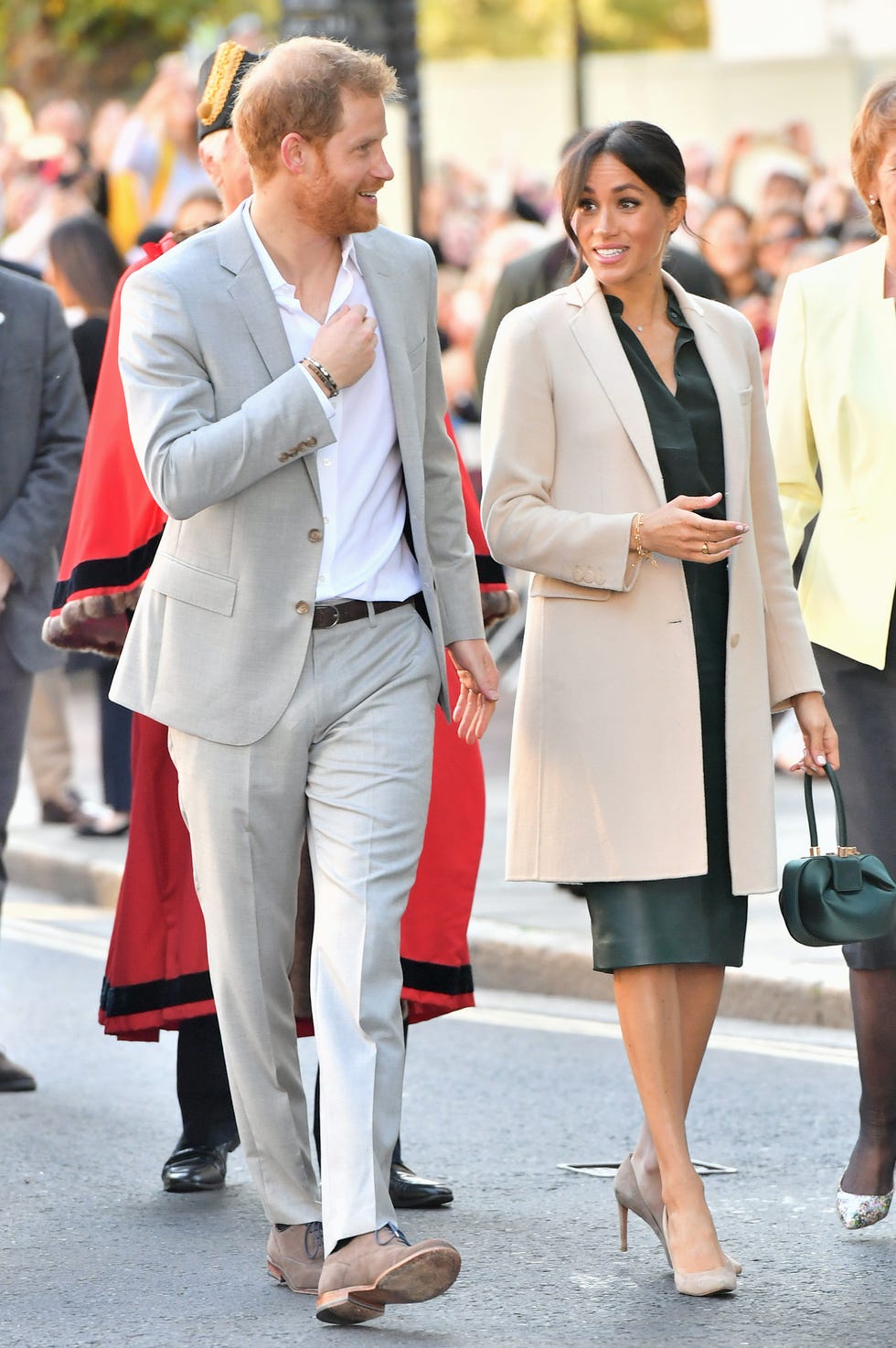 Meghan Markle and Prince Harry Arrive for Sussex Visit, & the Duchess Wears  Leather Skirt