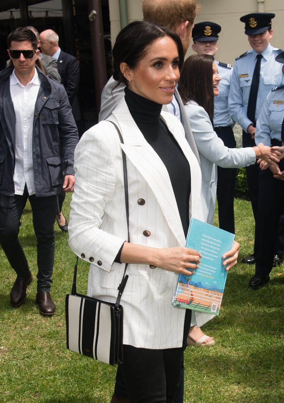 Meghan Markle's Oroton crossbody bag broke royal tradition