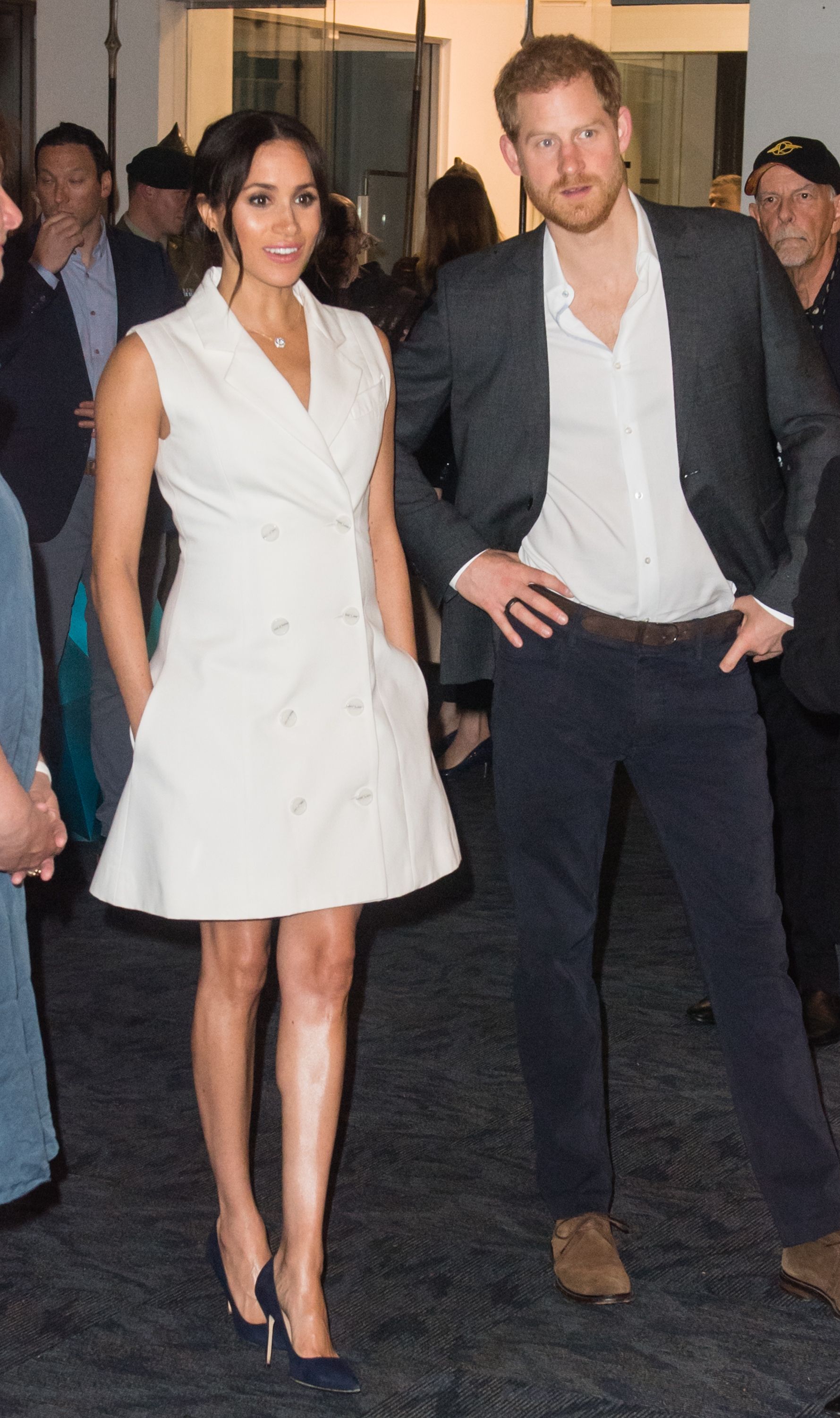 Meghan Markle in a White Brandon Maxwell Belted Jacket at the