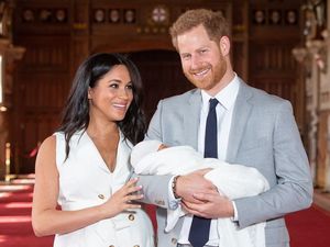 the duke  duchess of sussex pose with their newborn son