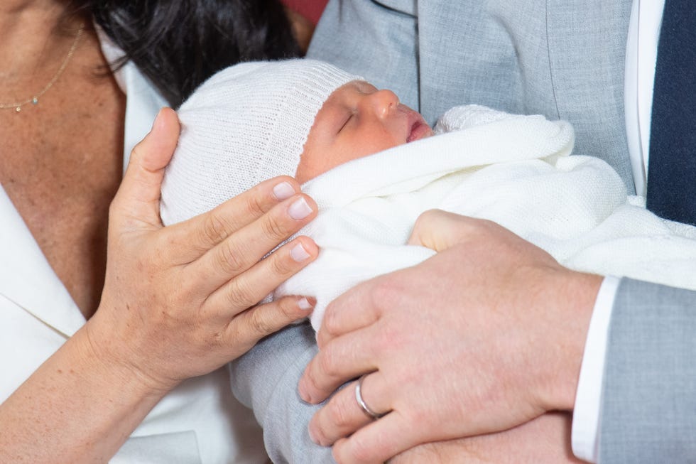 the duke  duchess of sussex pose with their newborn son