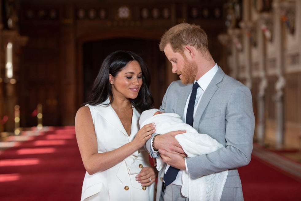 the duke  duchess of sussex pose with their newborn son