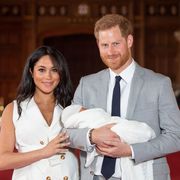 the duke and duchess of sussex pose with their newborn son