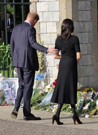 the prince and princess of wales accompanied by the duke and duchess of sussex greet wellwishers outside windsor castle