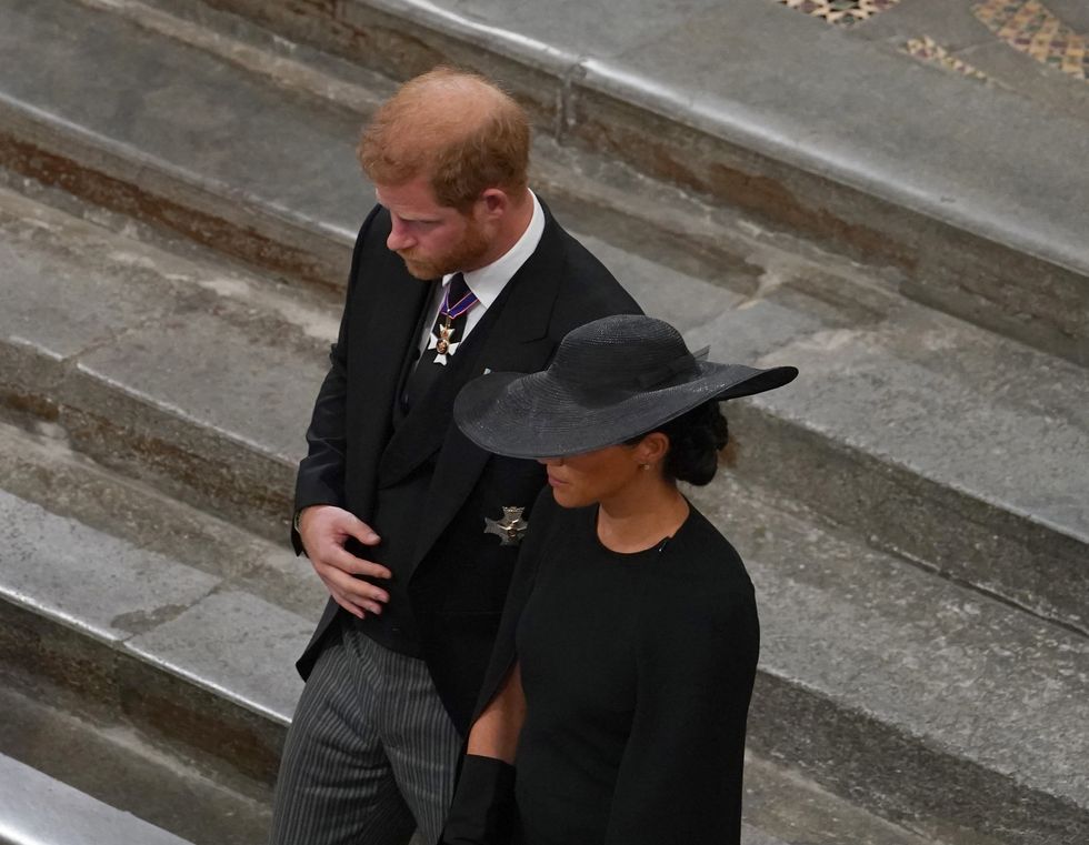 meghan and harry leaving the state funeral of queen elizabeth ii