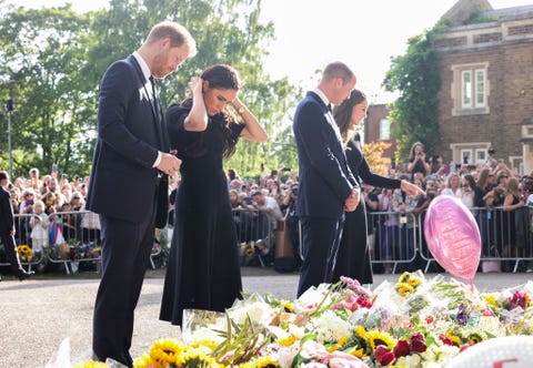 the prince and princess of wales accompanied by the duke and duchess of sussex greet wellwishers outside windsor castle