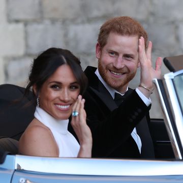 Meghan Markle and Prince Harry in a Jaguar