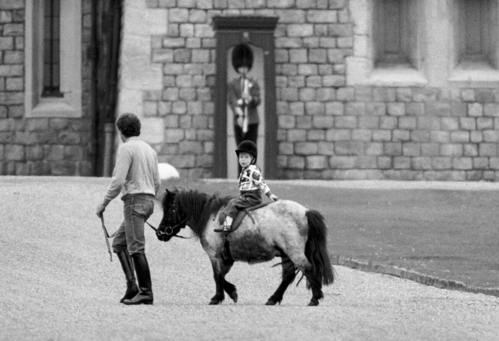 Prince Harry riding a pony at Windsor Castle