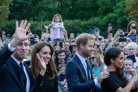 walk of the prince and princess of wales and the duke and duchess of sussex outside windsor castle
