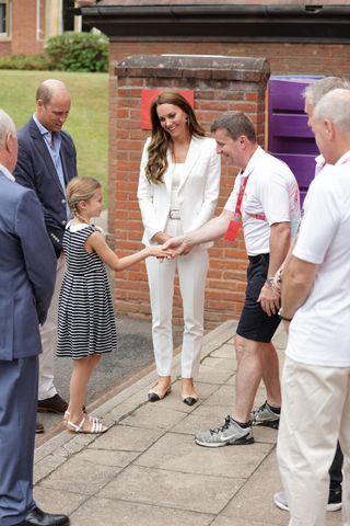 prince william, kate middleton, and princess charlotte at the commonwealth games