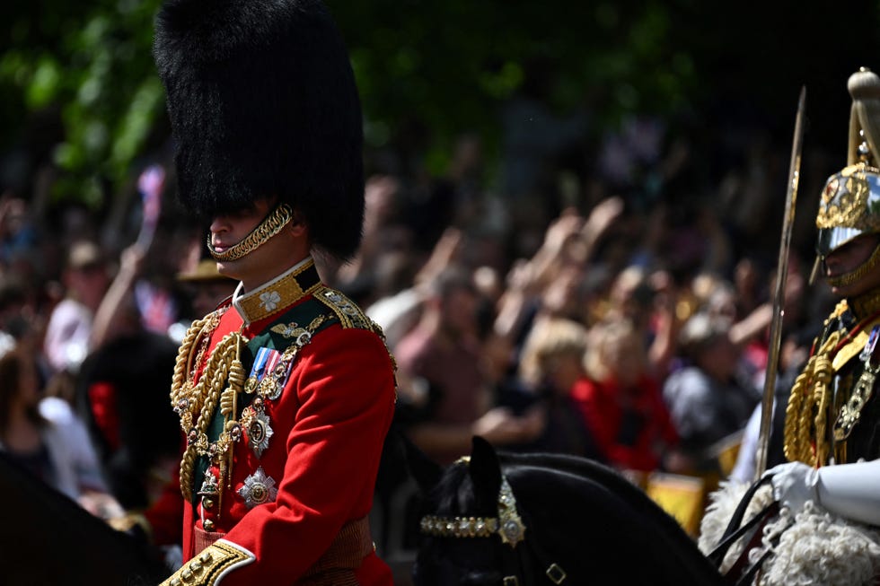 britains prince william, duke of cambridge, in his role as colonel of the irish guards, rides his horse along the mall during the queens birthday parade, the trooping the colour, as part of queen elizabeth iis platinum jubilee celebrations, in london on june 2, 2022   huge crowds converged on central london in bright sunshine on thursday for the start of four days of public events to mark queen elizabeth iis historic platinum jubilee, in what could be the last major public event of her long reign photo by ben stansall  afp photo by ben stansallafp via getty images