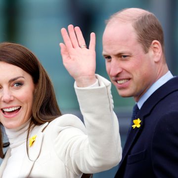 kate middleton waves as prince william looks on at her