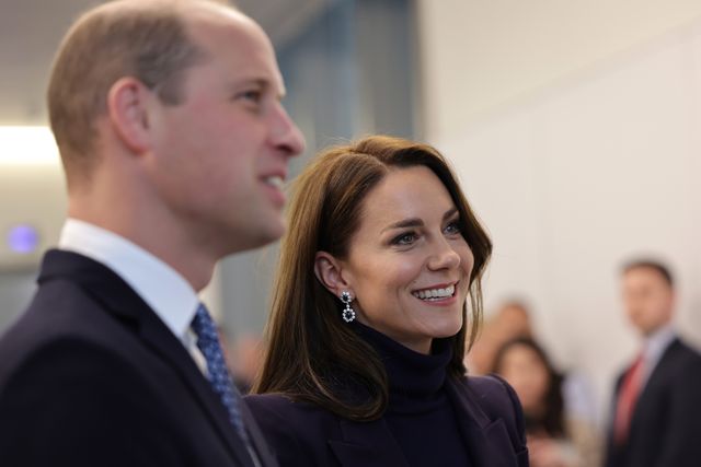 Prince William and Kate Middleton Greeted by Crowds on Rainy Evening in ...