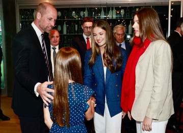group interaction at an event with a young girl and adults