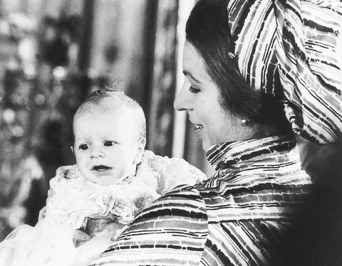 princess anne with her son peter phillips at his baptism at buckingham palace december 1977
