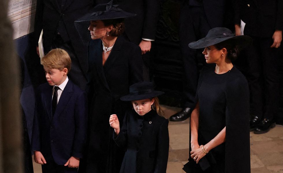 princess charlotte with meghan markle and kate middleton at queen elizabeth ii's funeral