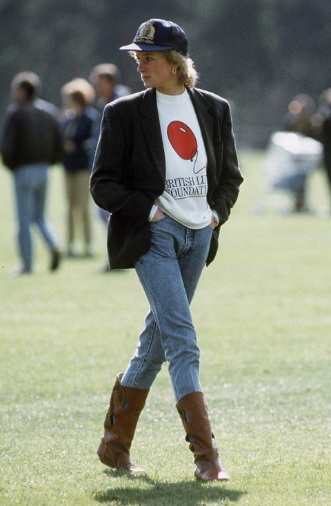 windsor, united kingdom   may 02  diana, princess of wales at guards polo club  the princess is casually dressed in a sweatshirt with the british lung foundation logo on the front, jeans, boots and a baseball cap  photo by tim graham photo library via getty images