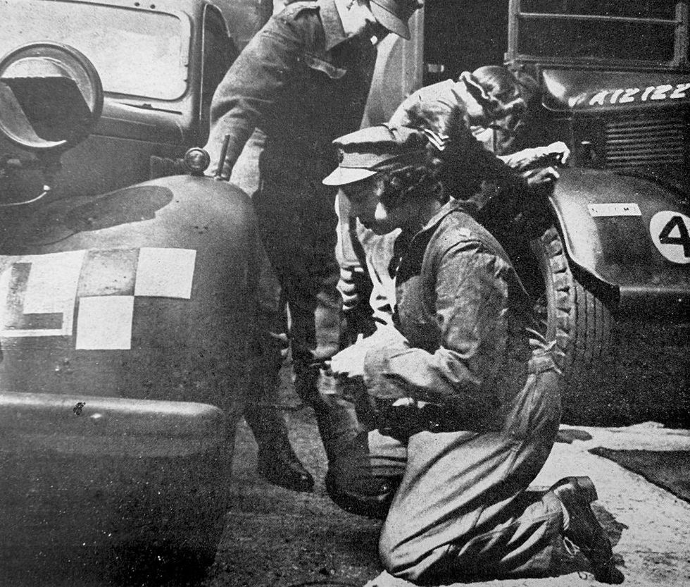 princess later queen  elizabeth of great britain doing technical repair work during her world war two military service, 1944