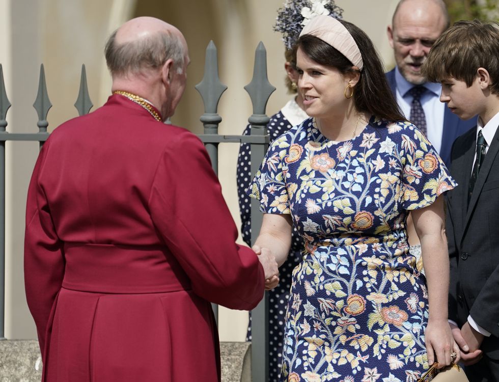 princess eugenie shakes hands with dean of windsor, the right revd david conner, as she leaves the easter matins service at st george's chapel at windsor castle
