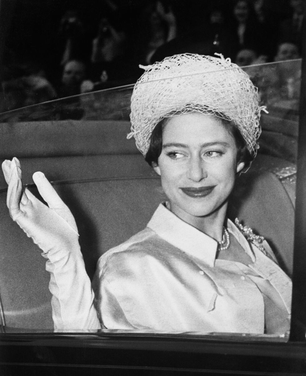 original caption princess margaret waves from her coach at buckingham palace here may 6th as she leaves on her honeymoon with antony armstrong jones