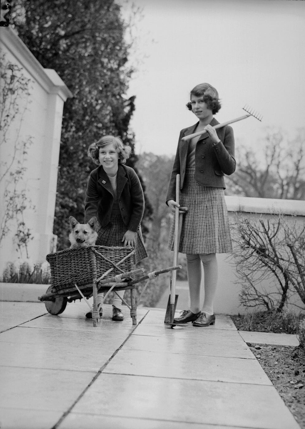 princess margaret and princess elizabeth in the garden