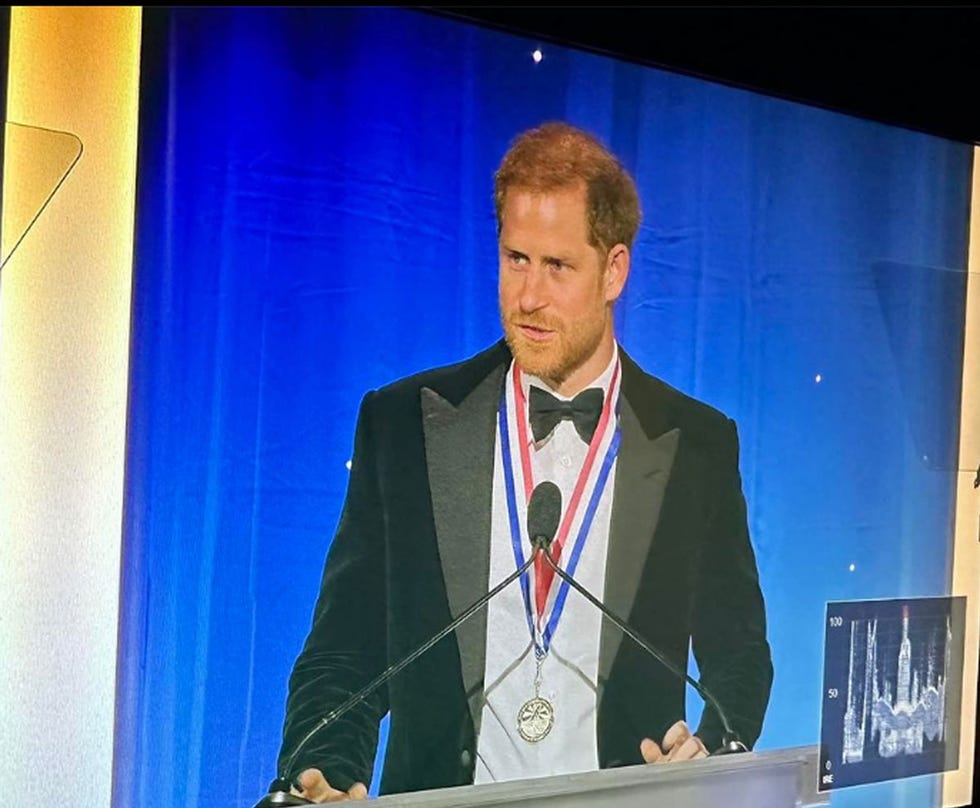a man standing at a podium