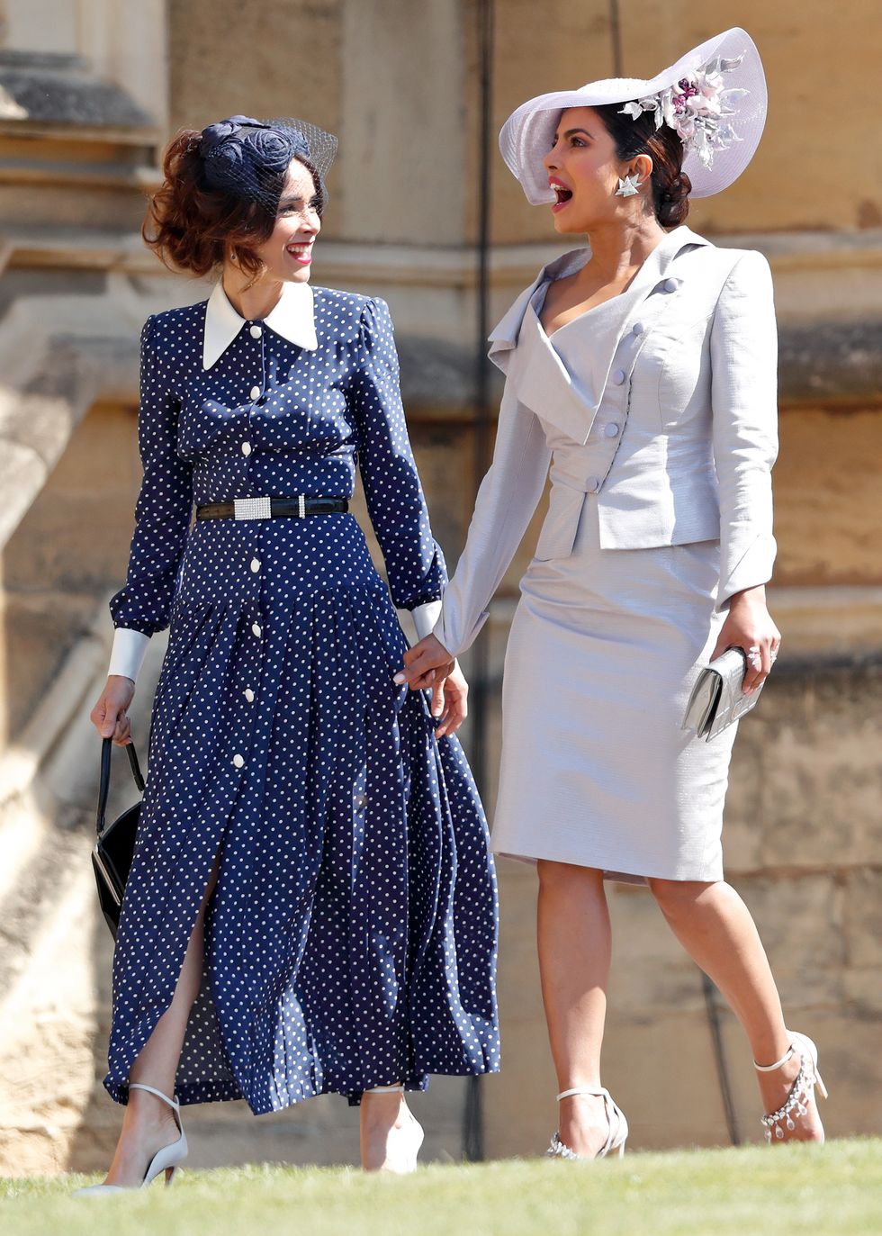 windsor, united kingdom may 19 embargoed for publication in uk newspapers until 24 hours after create date and time abigail spencer and priyanka chopra attend the wedding of prince harry to ms meghan markle at st georges chapel, windsor castle on may 19, 2018 in windsor, england prince henry charles albert david of wales marries ms meghan markle in a service at st georges chapel inside the grounds of windsor castle among the guests were 2200 members of the public, the royal family and ms markles mother doria ragland photo by max mumbyindigogetty images